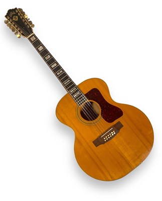 Lot 570 - YES INTEREST - A GUILD F-512 12 STRING ACOUSTIC GUITAR OWNED AND PLAYED BY CHRIS SQUIRE.