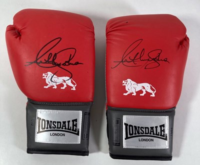 Lot 57 - BOXING MEMORABILIA - ANTHONY JOSHUA SIGNED BOXING GLOVES.