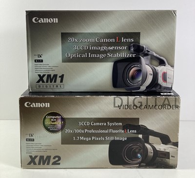 Lot 203 - CANON DIGITAL CAMCORDERS - XM1 AND XM2.