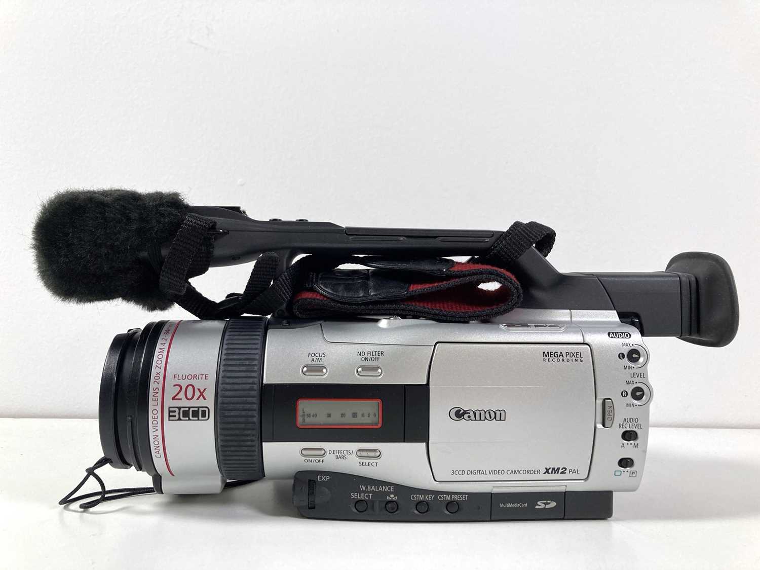 Lot 203 CANON DIGITAL CAMCORDERS XM1 AND XM2.
