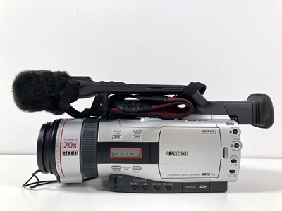 Lot 203 - CANON DIGITAL CAMCORDERS - XM1 AND XM2.