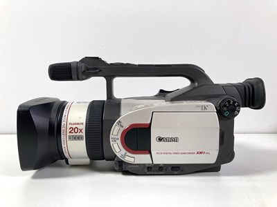 Lot 203 - CANON DIGITAL CAMCORDERS - XM1 AND XM2.