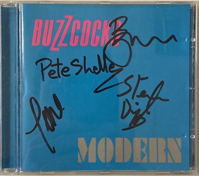 Lot 305 - BUZZCOCKS SIGNED CD AND MERCHANDISE BAGS