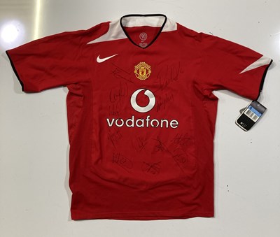 Lot 43 - MANCHESTER UNITED - 2004 HOME SHIRT SIGNED BY ROONEY, RONALDO AND MORE.