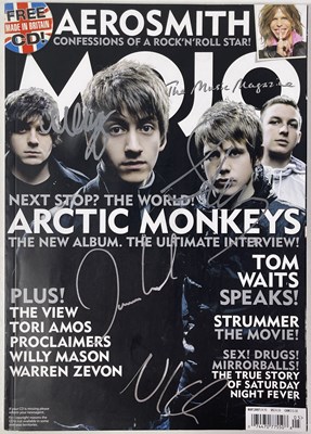 Lot 251 - ARCTIC MONKEYS -FULLY SIGNED MAGAZINE COVER.