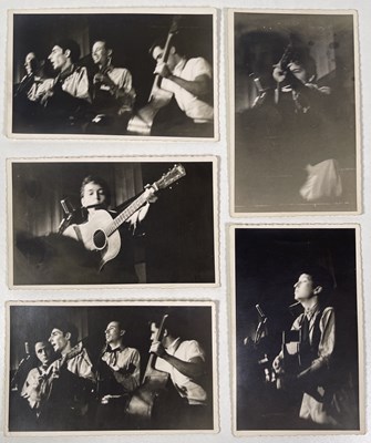 Lot 469 - BOB DYLAN - UNSEEN / UNPUBLISHED PHOTOGRAPHS OF A 1961 PERFORMANCE, THREE SIGNED BY DYLAN, SOLD WITH COPYRIGHT.