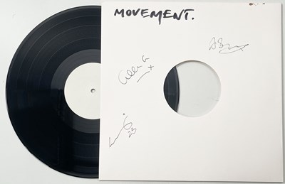 Lot 94 - NEW ORDER - MOVEMENT (2019) WHITE LABEL TEST PRESSING - SIGNED TO SLEEVE BY BAND..