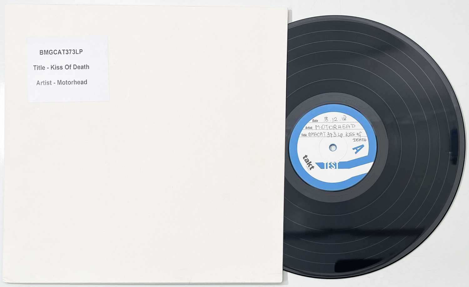 Lot 118 - MOTORHEAD - KISS OF DEATH (BMGCAT373LP) WHITE LABEL TEST PRESSING.