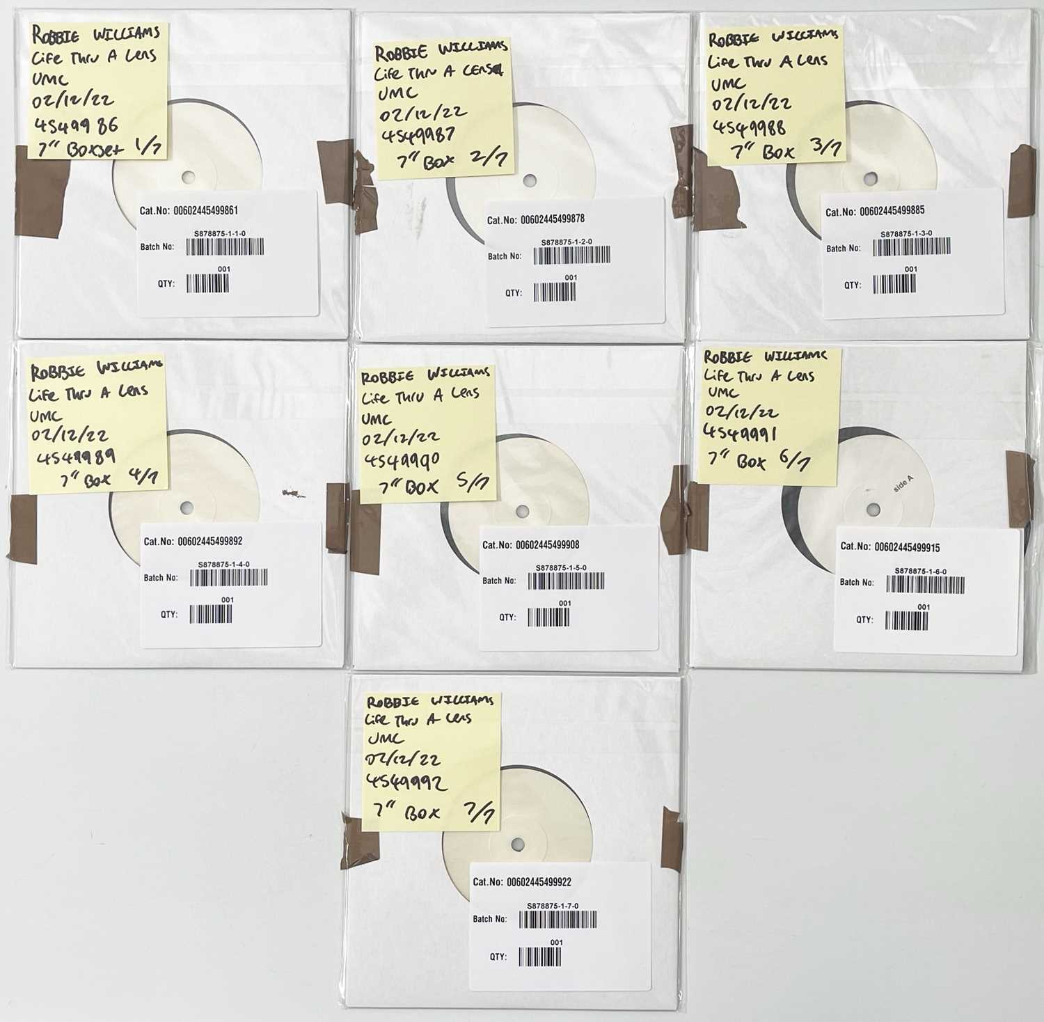 Lot 210 - ROBBIE WILLIAMS - 7" SINGLES BOX - WHITE LABEL TEST PRESSINGS.