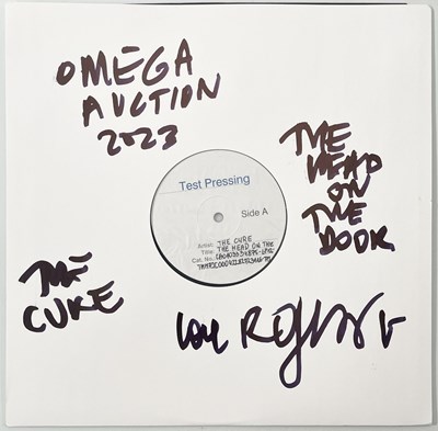 Lot 215 - THE CURE - THE HEAD ON THE DOOR (2008 RE)  WHITE LABEL TEST PRESSING SIGNED BY ROBERT SMITH.