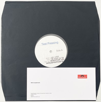 Lot 215 - THE CURE - THE HEAD ON THE DOOR (2008 RE)  WHITE LABEL TEST PRESSING SIGNED BY ROBERT SMITH.