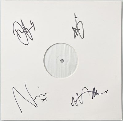 Lot 219 - TRAVIS - FULLY SIGNED WHITE LABEL TEST PRESSING.