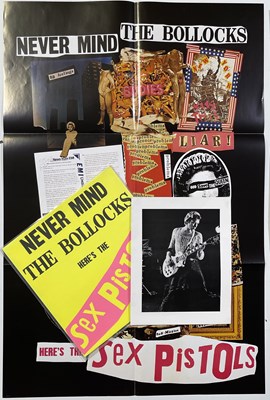 Lot 535 - SEX PISTOLS - CUTTINGS/VINYL/MEMORABILIA PACK.