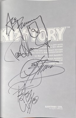 Lot 433 - KISS - KISSTORY BOOK FULLY SIGNED.