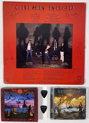 Lot 300 - URIAH HEEP - SIGNED LP AND CDS.