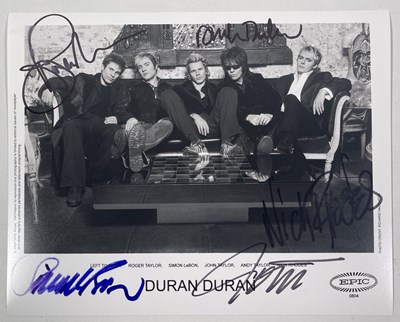 Lot 313 - DURAN DURAN - SIGNED PROMOTIONAL PHOTO.