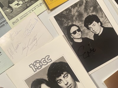 Lot 495 - 10CC - MEMORABILIA INC SIGNED POSTCARD /  BADGES / PHOTOS / ZINES.