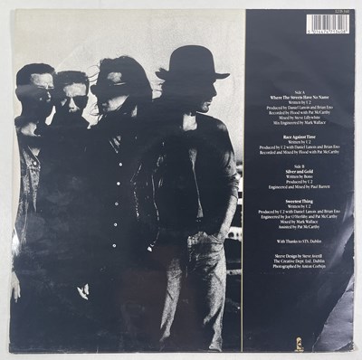 Lot 350 - U2 - SIGNED COPY OF WHERE THE STREETS HAVE NO NAME.