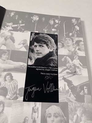 Lot 389 - THE BEATLES - JURGEN VOLLMER SIGNED GENESIS BOOK.