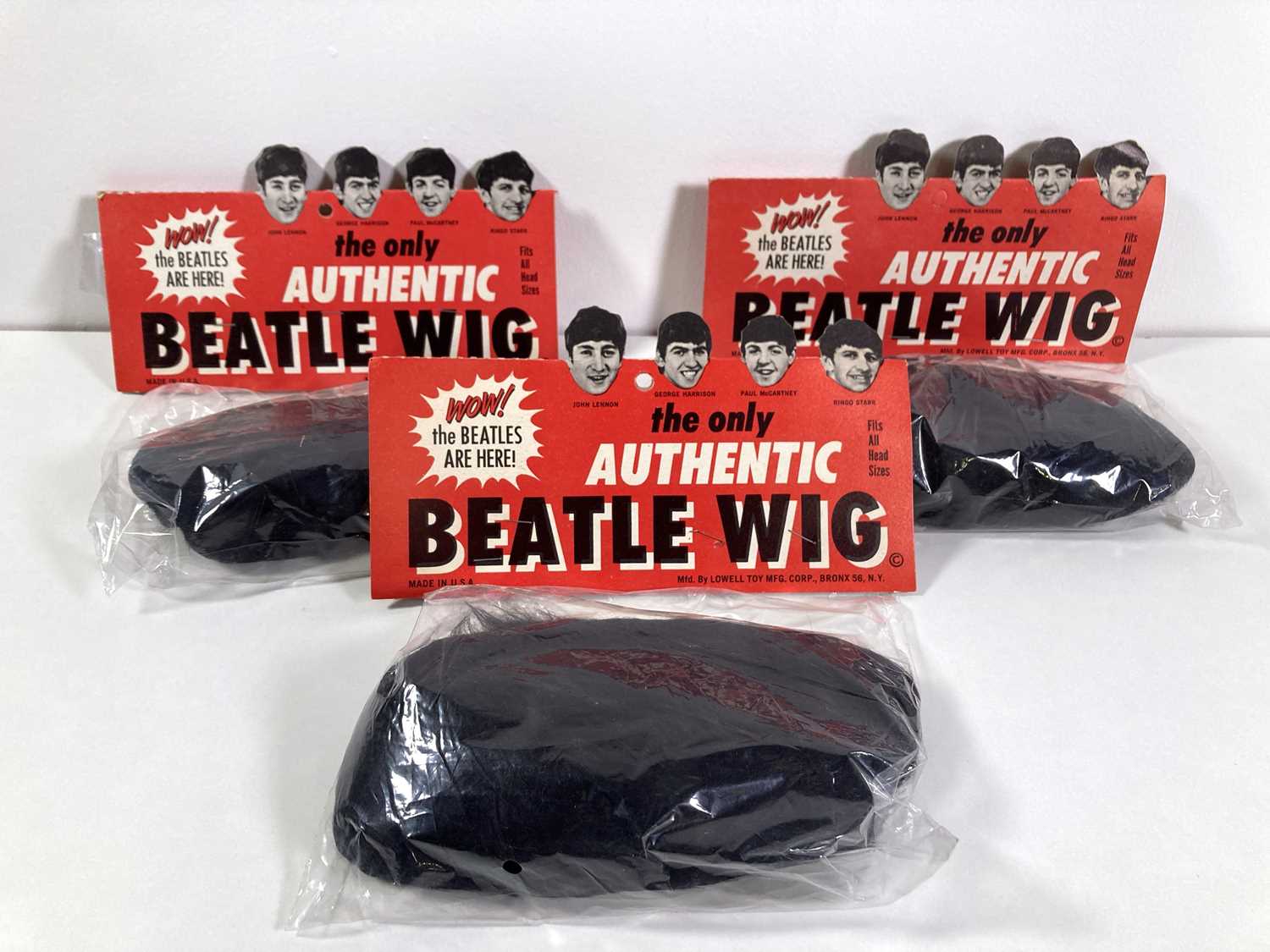 Lot 382 - THE BEATLES - THREE WIGS MANUFACTURED BY LOWELL.