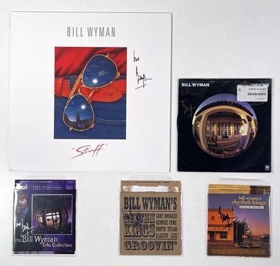 Lot 303 - THE ROLLING STONES INTEREST - FIVE BILL WYMAN SIGNED ITEMS.