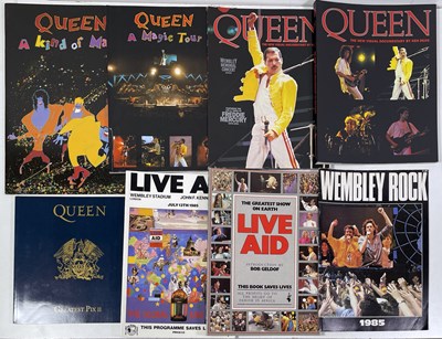 Lot 408 - QUEEN - TOUR BOOKS / PROGRAMMES INC LIVE AID - KIND OF MAGIC TICKET.