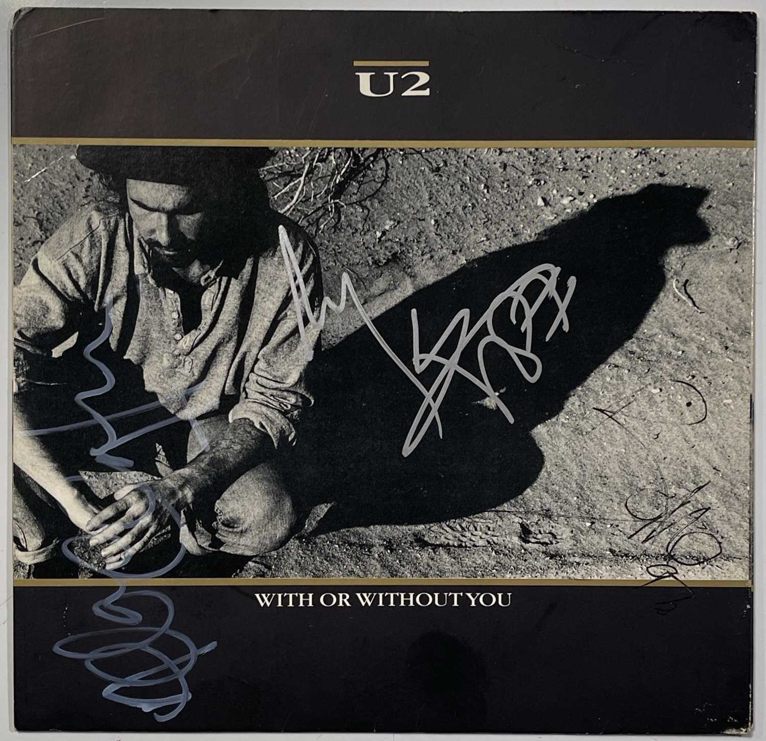 Lot 308 - U2 - FULLY SIGNED 7" SLEEVE.