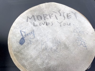 Lot 539 - THE SMITHS - STAGE USED AND SIGNED TAMBOURINE C 1984.