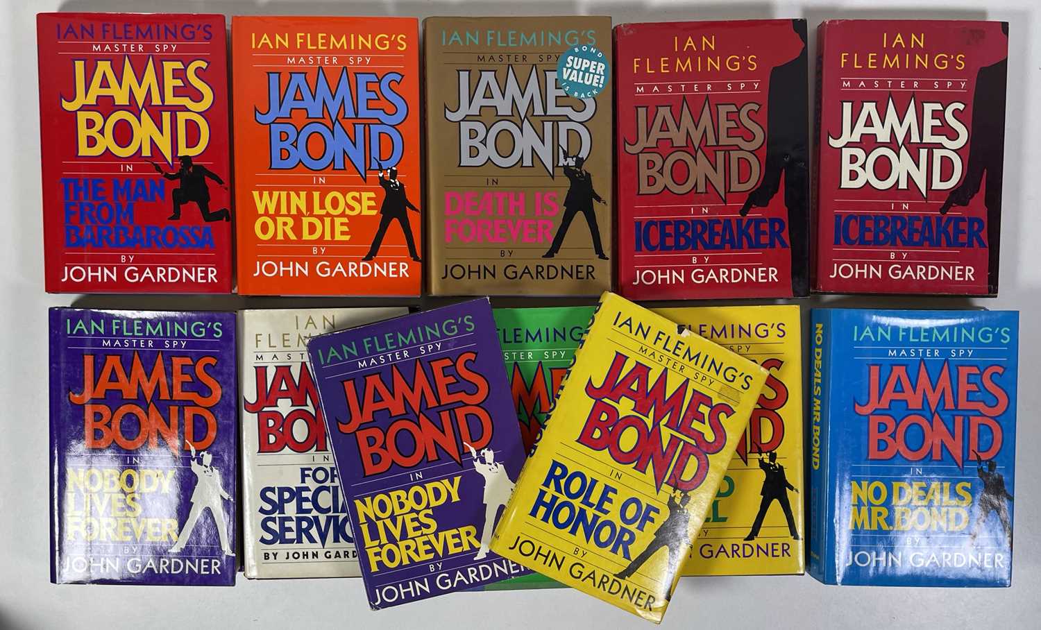 Lot 21 - JOHN GARDNER - JAMES BOND - A COMPLETE SET OF PUTNAM PUBLISHED BOOKS, MOST 1ST EDITIONS.