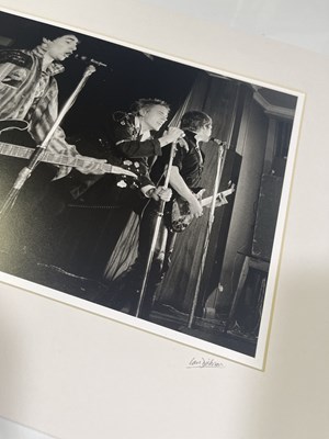 Lot 98 - THE SEX PISTOLS - IAN DICKSON SIGNED NOTRE DAME PHOTO PRINT.