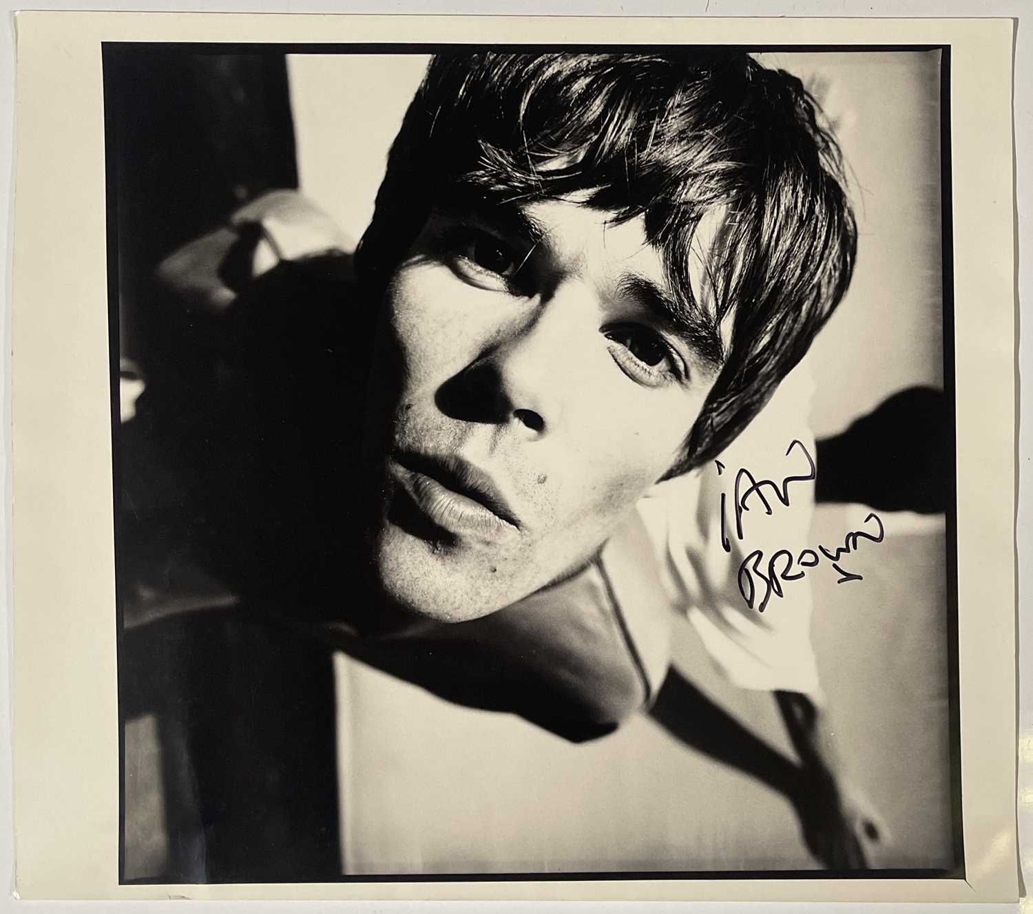 Lot 421 - THE STONE ROSES - SIGNED IAN BROWN PHOTOGRAPH.