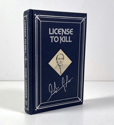 Lot 302 - JOHN GARDNER - JAMES BOND - LICENSE TO KILL - ARMCHAIR DETECTIVE FIRST EDITION 1990.