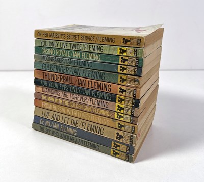 Lot 47 - IAN FLEMING - JAMES BOND - SET OF PAN PUBLISHED PAPER BACK BOOKS WITH HAWKEYE COVERS.