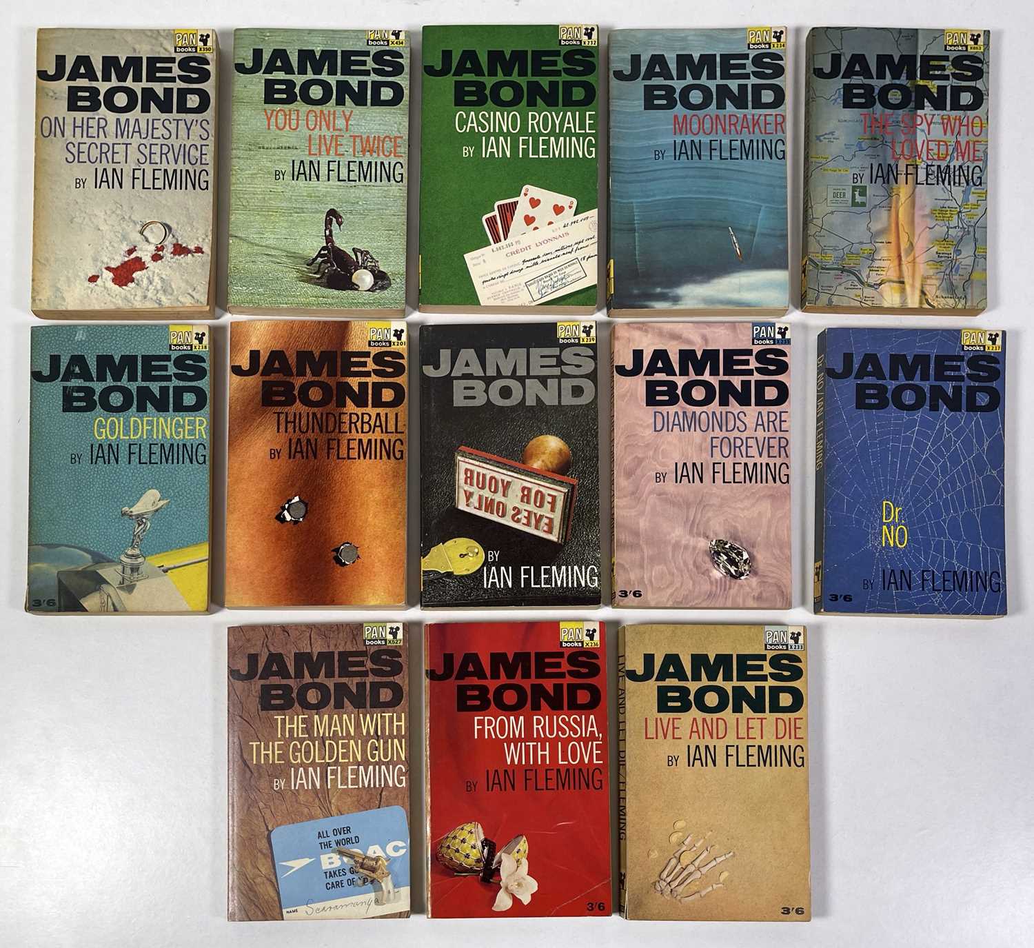 Lot 47 - IAN FLEMING - JAMES BOND - SET OF PAN PUBLISHED PAPER BACK BOOKS WITH HAWKEYE COVERS.