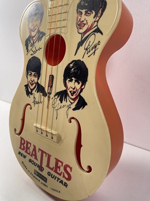 Lot 167 - THE BEATLES - SELCOL NEW SOUND GUITAR.