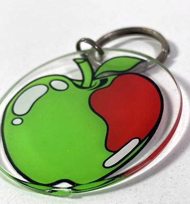 Lot 194 - THE BEATLES - A RARE APPLE KEY RING.