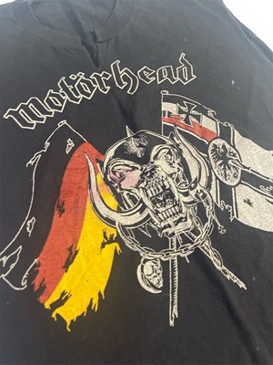 Lot 260 - MOTORHEAD- AN ORIGINAL T-SHIRT OWNED AND WORN BY LEMMY.