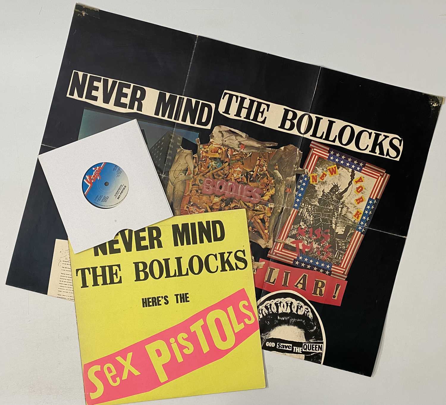 Lot 223 - SEX PISTOLS - NEVER MIND THE BOLLOCKS LP (COMPLETE ORIGINAL COPY WITH POSTER AND 7" - 'SPOTS 001')