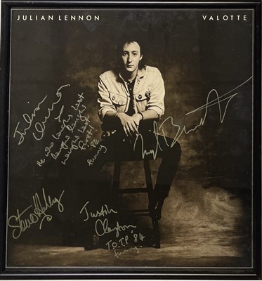 Lot 20 - JULIAN LENNON - MEMORABILIA INC FULLY SIGNED PIECE.