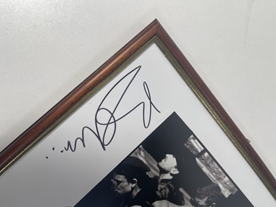 Lot 92 - U2 - A SIGNED PRINT.