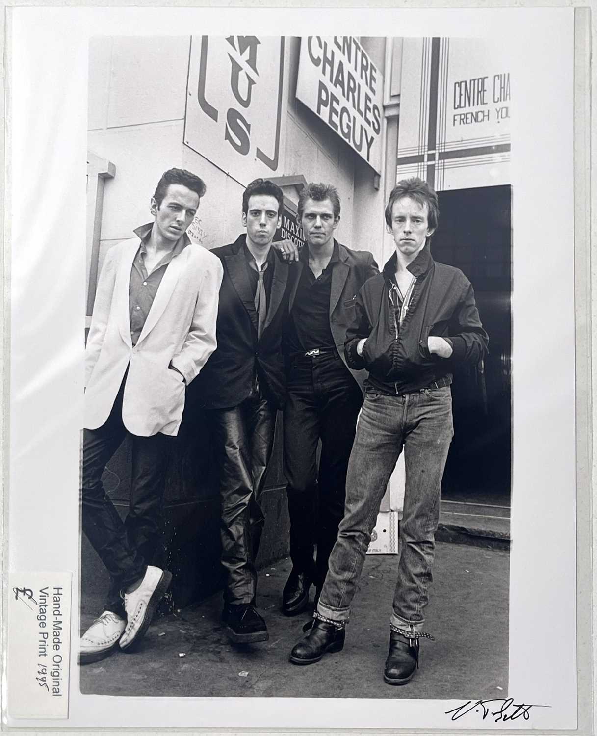 Lot 47 - THE CLASH - A VINTAGE PHOTO PRINT OF THE GROUP IN LONDON, 1979 - VIRGINIA TURBETT.