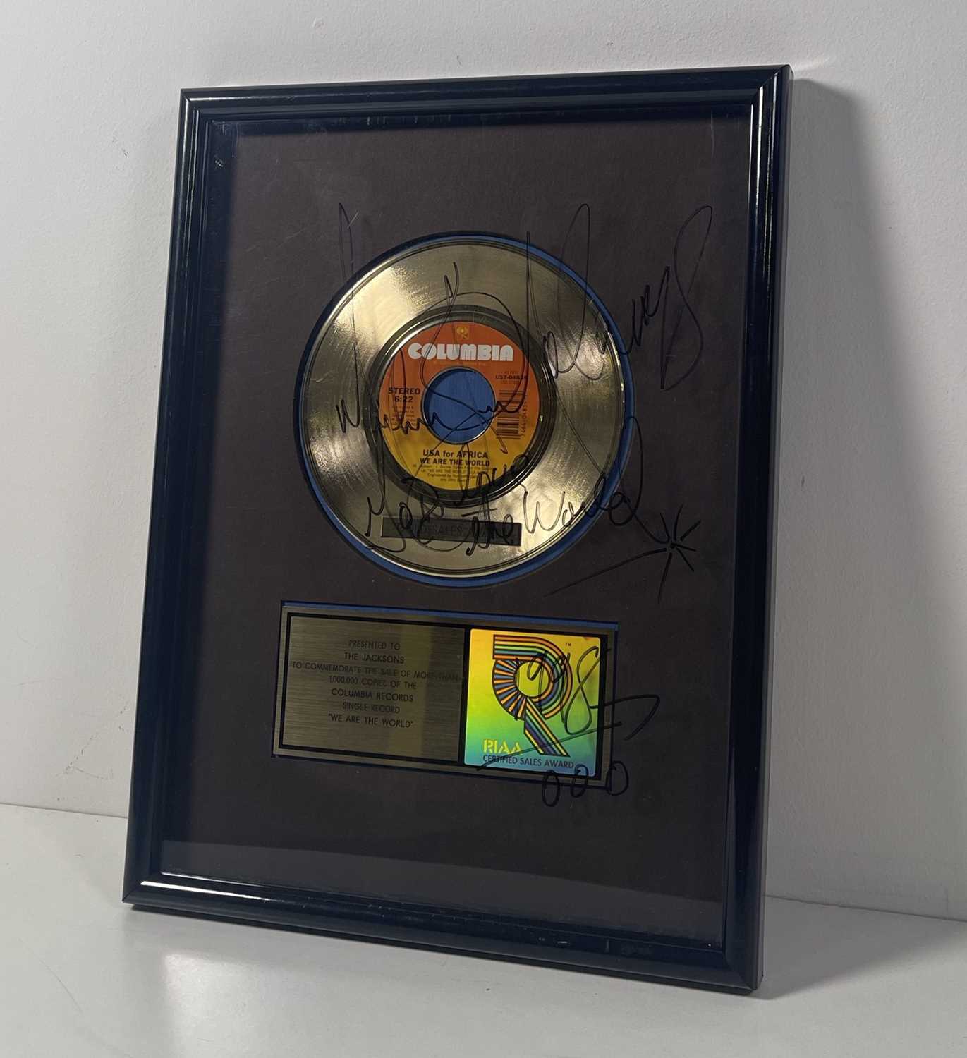 Lot 148 - MICHAEL JACKSON - A SIGNED RIAA AWARD FOR 'WE ARE THE WORLD'.