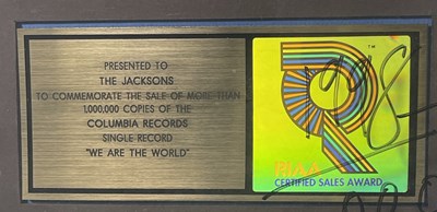 Lot 148 - MICHAEL JACKSON - A SIGNED RIAA AWARD FOR 'WE ARE THE WORLD'.