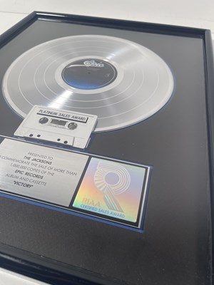 Lot 149 - MICHAEL JACKSON INTEREST - THE JACKSONS - OFFICIAL RIAA PLATNUM DISC AWARD FOR 'VICTORY'.