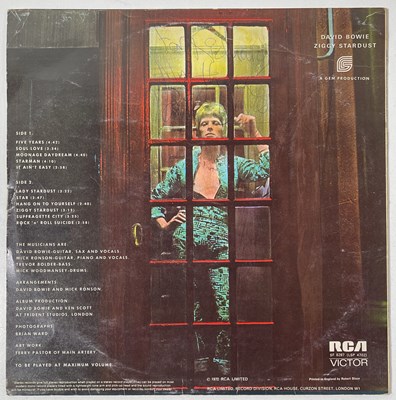 Lot 283 - DAVID BOWIE - A COPY OF ZIGGY STARDUST SIGNED BY DAVID BOWIE AND MICK RONSON.