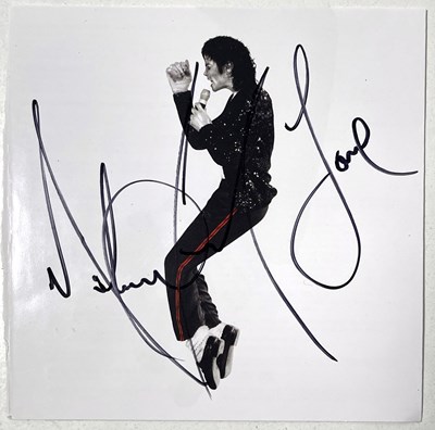 Lot 156 - MICHAEL JACKSON - A SIGNED CD BOOKLET.