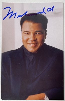 Lot 303 - MUHAMMED ALI/ CASSIUS CLAY ORIGINAL TICKET AND SIGNED PHOTOCARD.