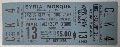 Lot 303 - MUHAMMED ALI/ CASSIUS CLAY ORIGINAL TICKET AND SIGNED PHOTOCARD.