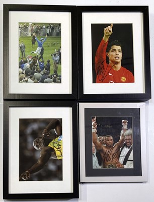 Lot 313 - SPORTING LEGENDS - SIGNED AND FRAMED PHOTOS INC TYSON / BOLT / DETTORI / RONALDO.