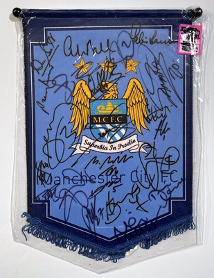 Lot 368 - MANCHESTER CITY FC - TWO SIGNED CLUB PENNANTS AND SIGNED SHIRT.